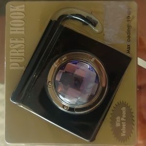 Purse hook  with velvet pouch  can hold up to 10 lbs